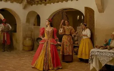 Mercados españoles del siglo XVI con telas vibrantes