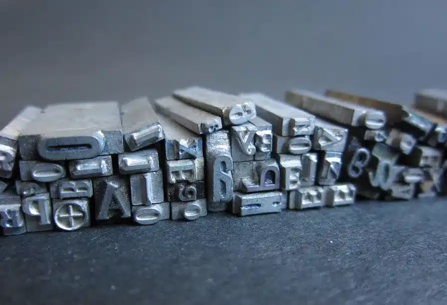 5. La invención de la imprenta por Gutenberg en el siglo XV